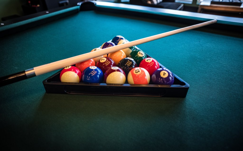Pool balls and pool cue
